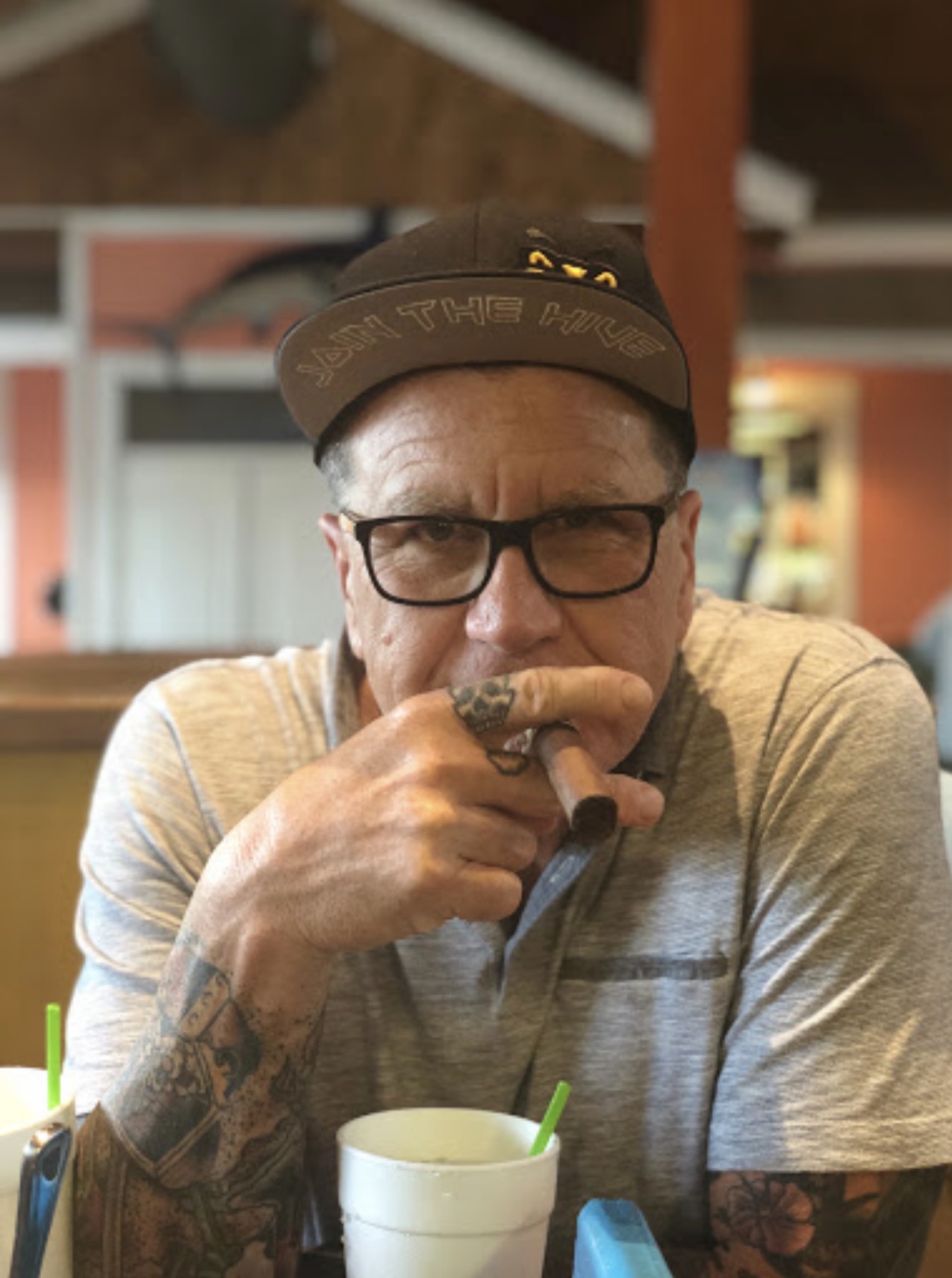 Portrait of John Dunn with a cigar
